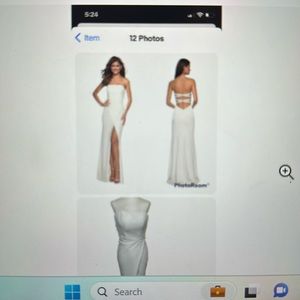 Beautiful Black La Femme long dress with open front legs showing